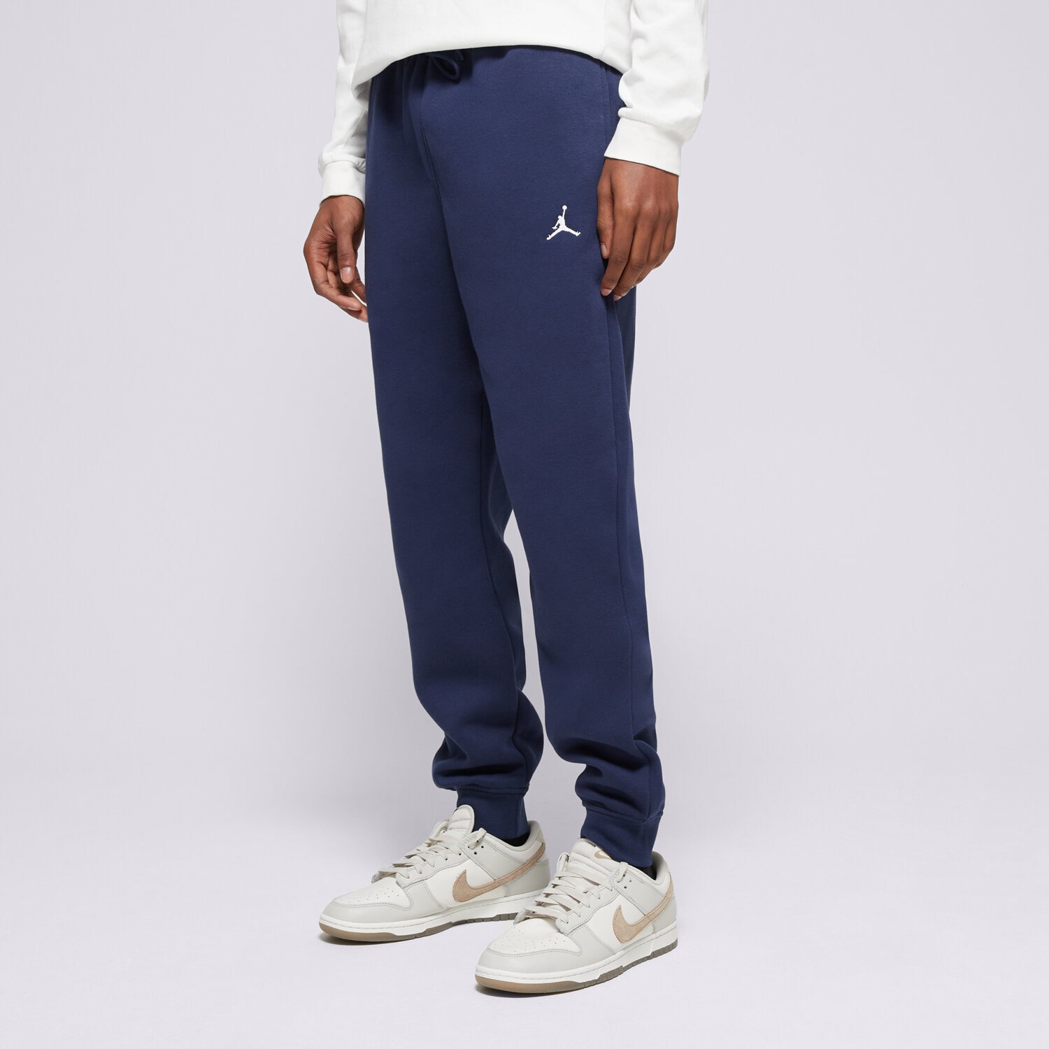 Spodnie sportowe męskie SPODNIE M JORDAN BRKLN FLC PANT  FV7277-410 GRANATOWY
