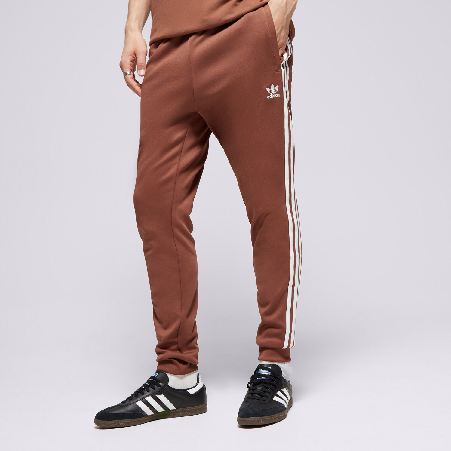 Spodnie sportowe męskie ADIDAS SPODNIE SST TP IY9866 BRĄZOWY