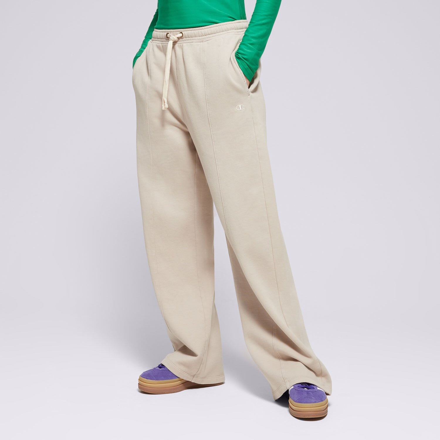 Spodnie sportowe damskie CHAMPION SPODNIE WIDE LEG PANTS 117638MS016 BEŻOWY