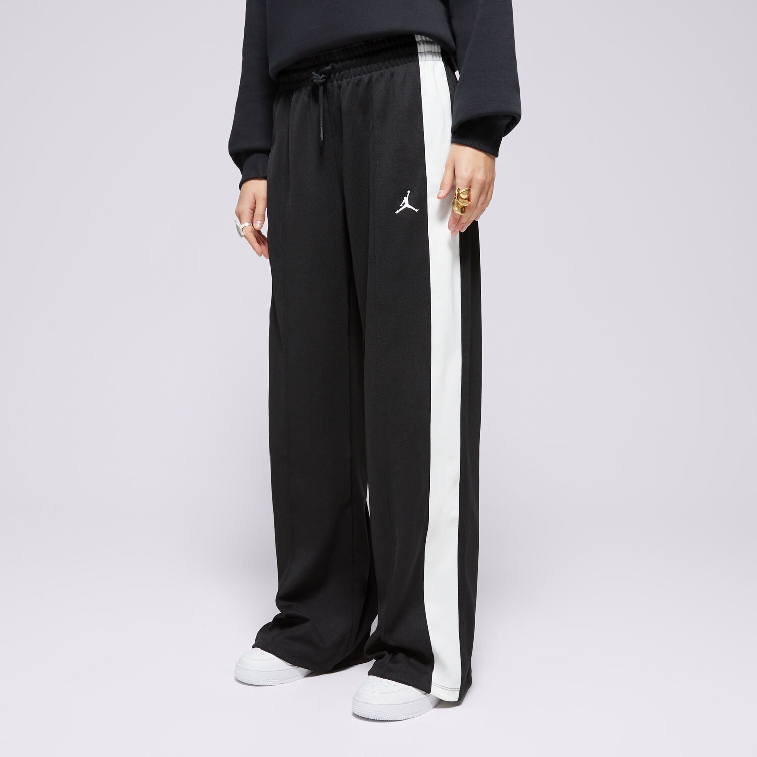 Spodnie sportowe damskie SPODNIE W JORDAN KNIT TRACK PANT  FV7101-010 CZARNY