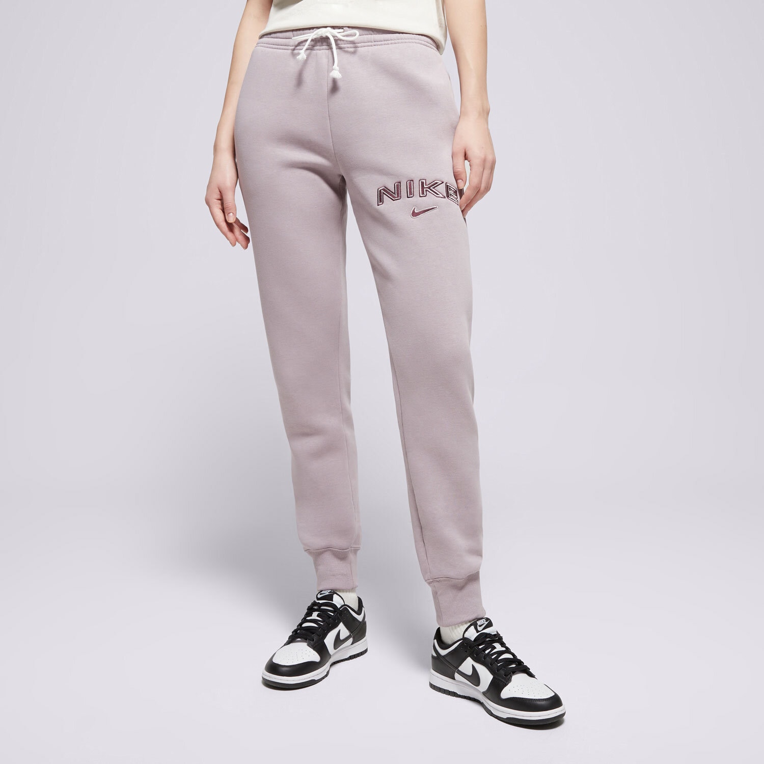 Spodnie sportowe damskie NIKE SPODNIE W NSW PHNX FLC MR STD LOGO PNT HM9757-226 FIOLETOWY