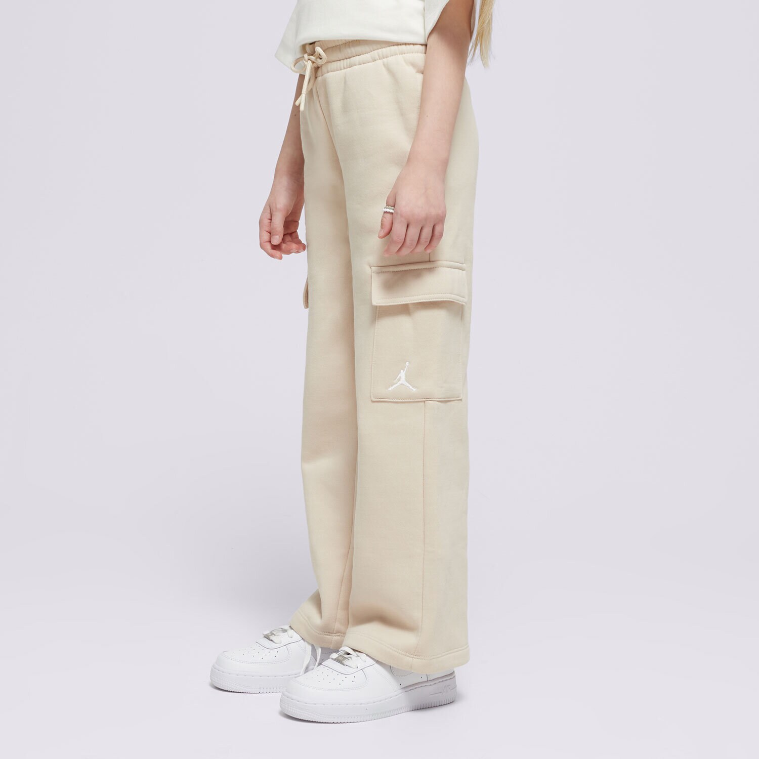 Sportowe spodnie dziecięce JORDAN SPODNIE JDG Y2K FLC CARGO GIRL 45D351-XAE BEŻOWY