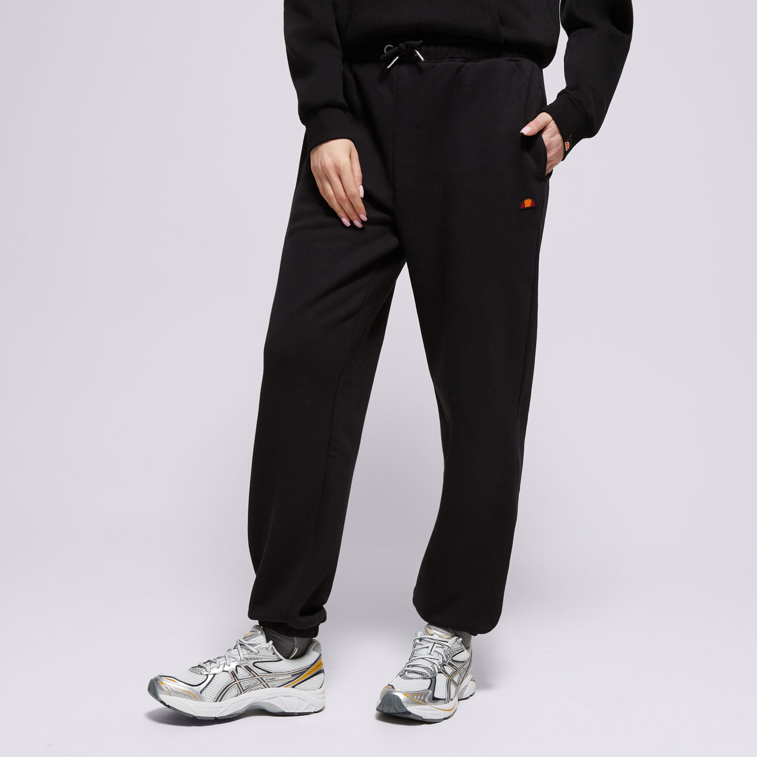 Spodnie sportowe damskie ELLESSE SPODNIE MUGIA JOG PANT BLK SMG22040011 CZARNY