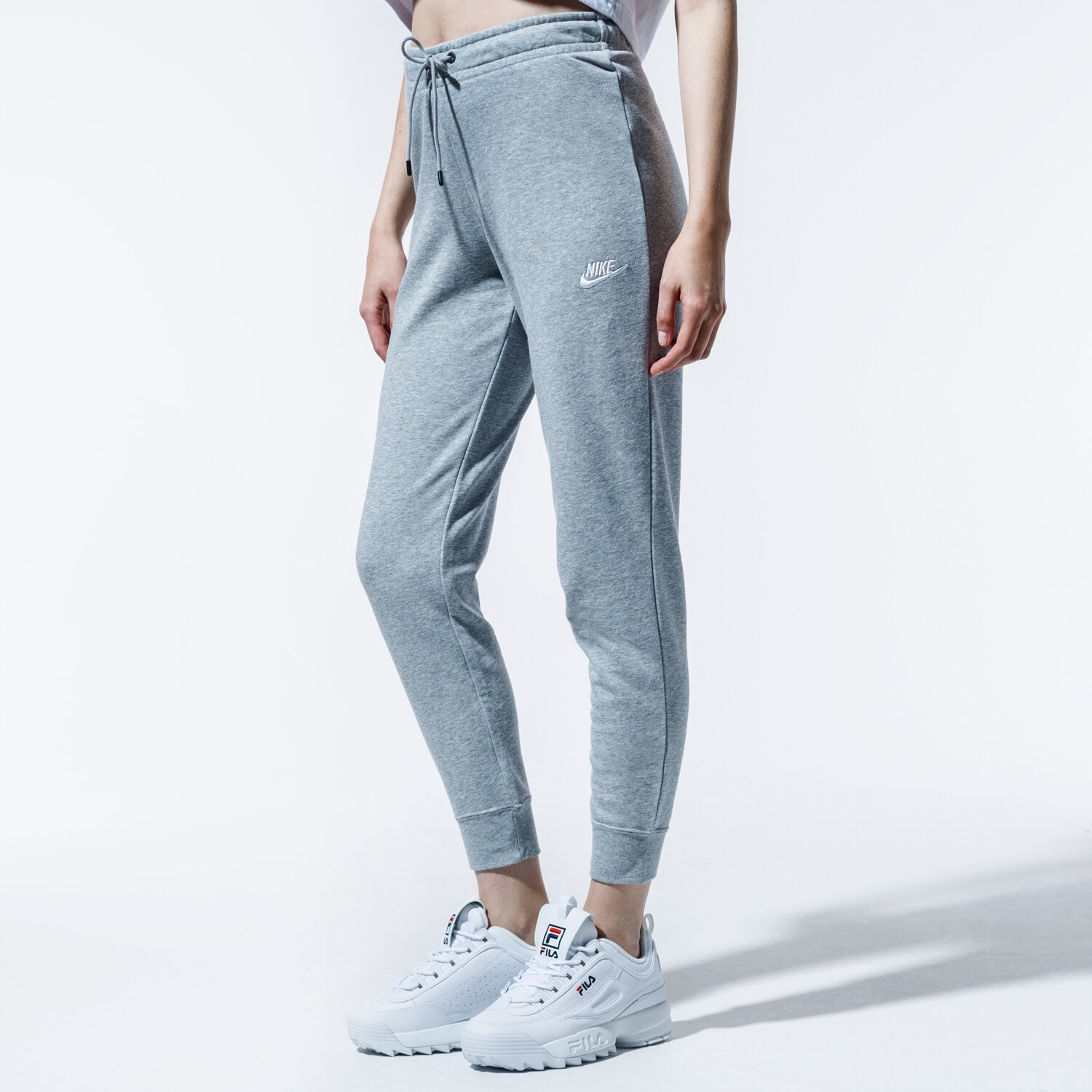 Spodnie sportowe damskie NIKE SPODNIE SPORTSWEAR ESSENTIAL BV4099-063 SZARY