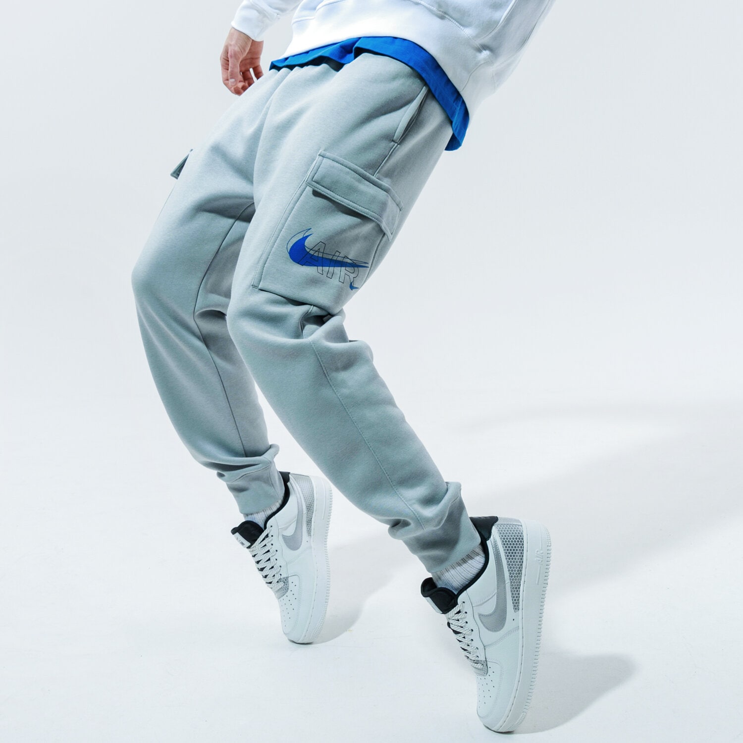 Spodnie sportowe męskie NIKE SPODNIE M NSW PANT CARGO AIR PRNT PACK DD9696-077 SZARY