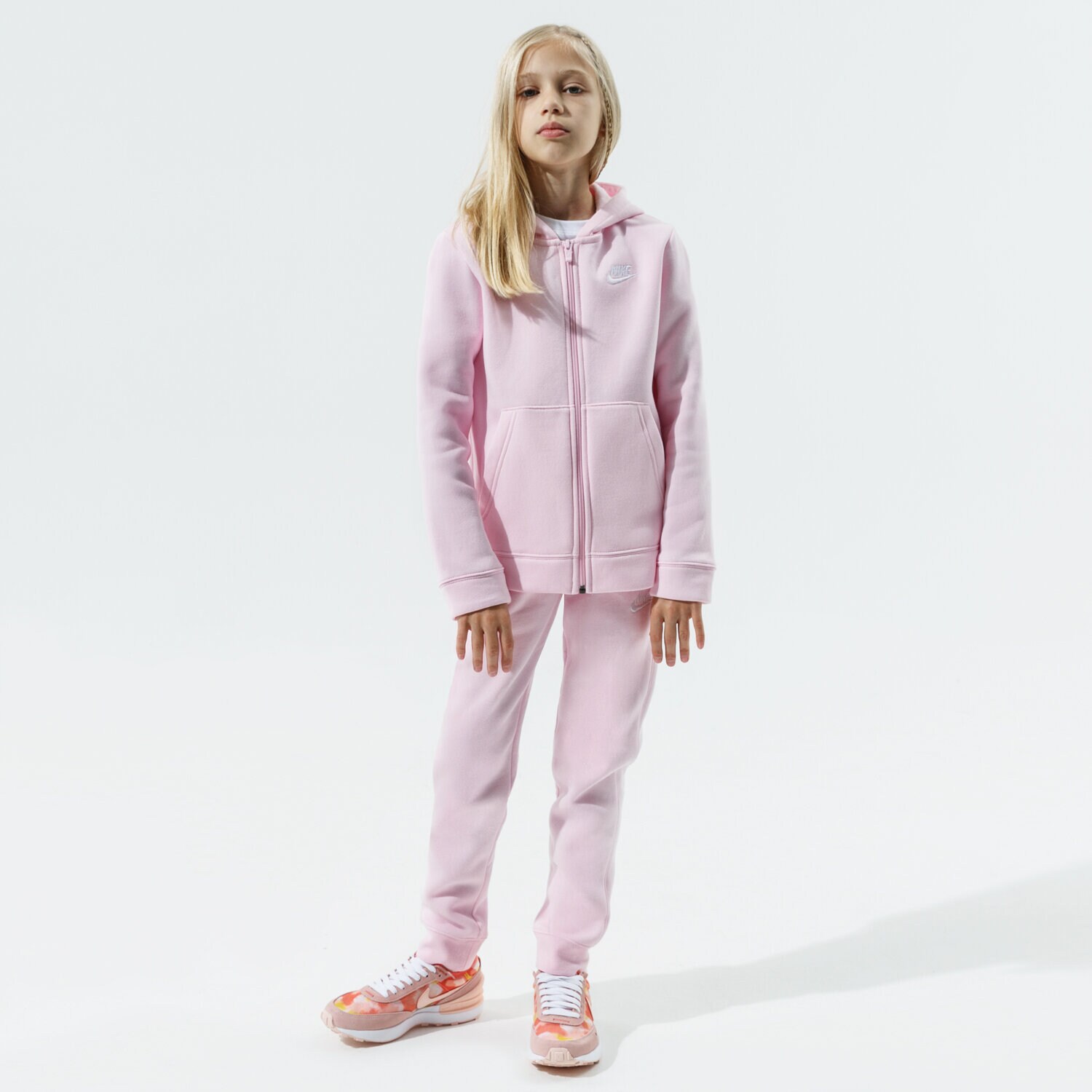 Sportowe spodnie dziecięce NIKE KOMPLET SPORTSWEAR GIRL BV3634-663 RÓŻOWY
