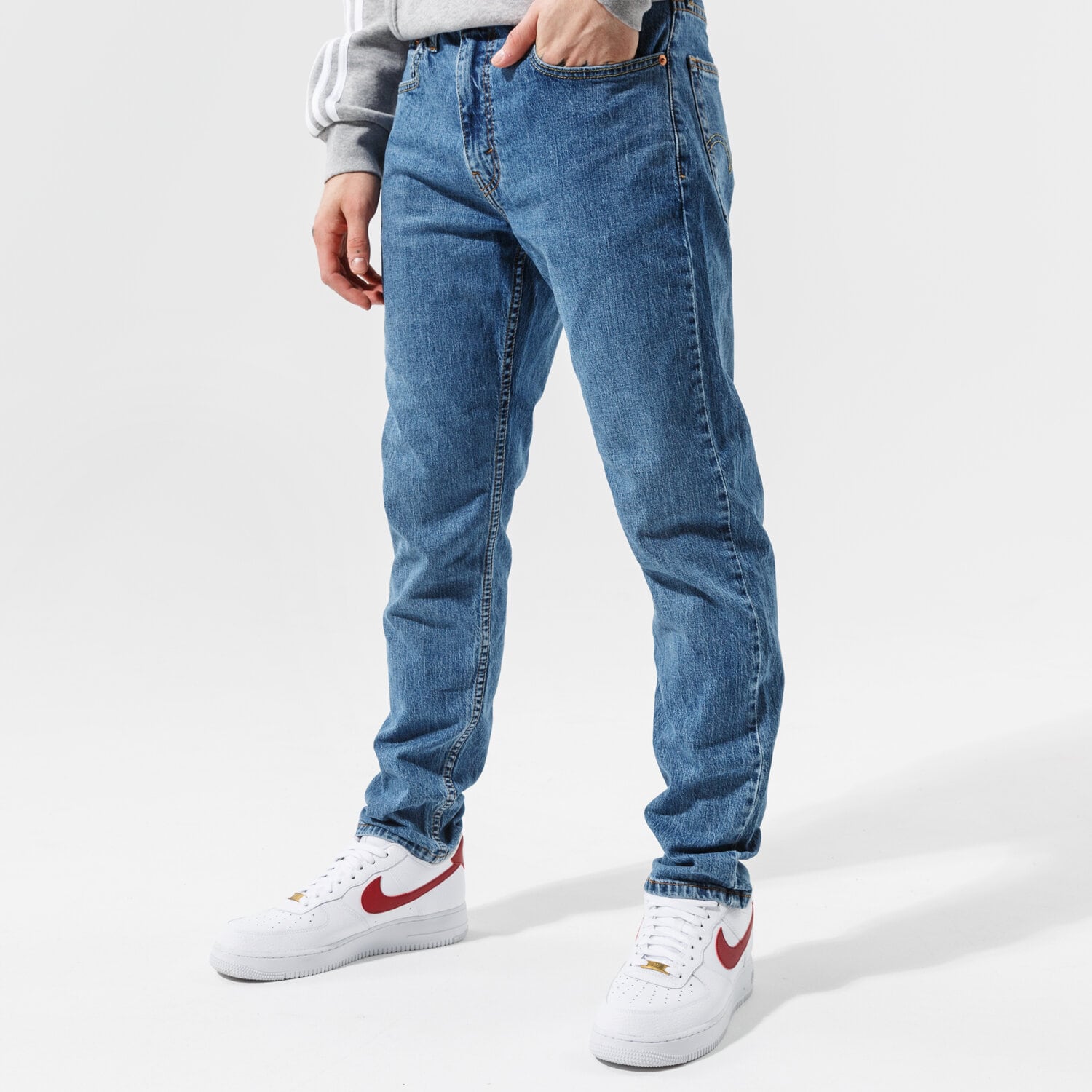 Spodnie sportowe męskie LEVI'S SPODNIE 502 TAPER HI BALL 577830099 NIEBIESKI