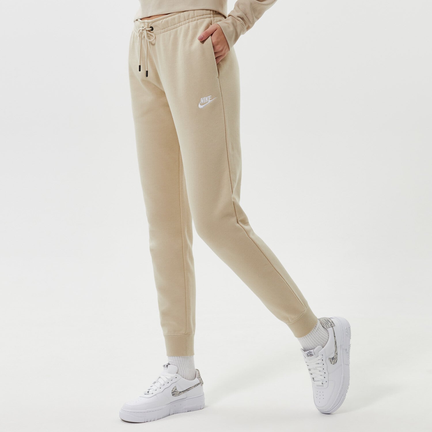 Spodnie sportowe damskie NIKE SPODNIE SPORTSWEAR ESSENTIAL BV4095-206 BEŻOWY