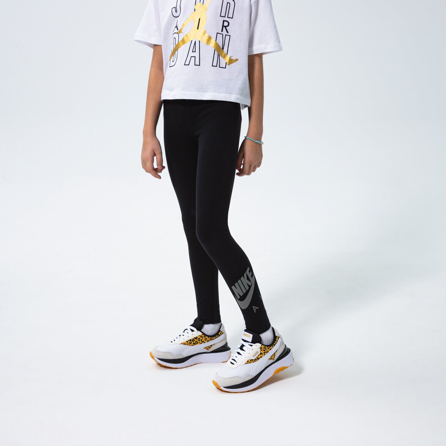 Sportowe spodnie dziecięce NIKE LEGGINGS G NSW AIR FAVORITES LGGNG GIRL DD7140-010 CZARNY