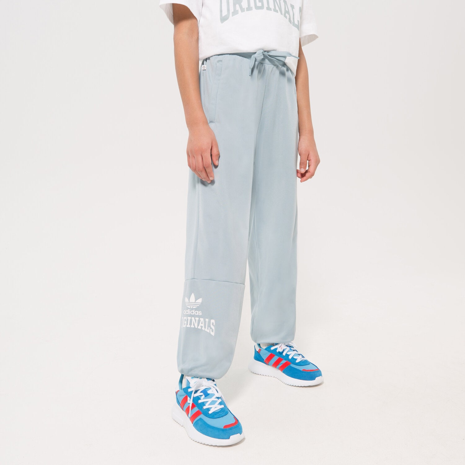 Sportowe spodnie dziecięce ADIDAS SPODNIE TRACK PANTS GIRL HL6883 NIEBIESKI