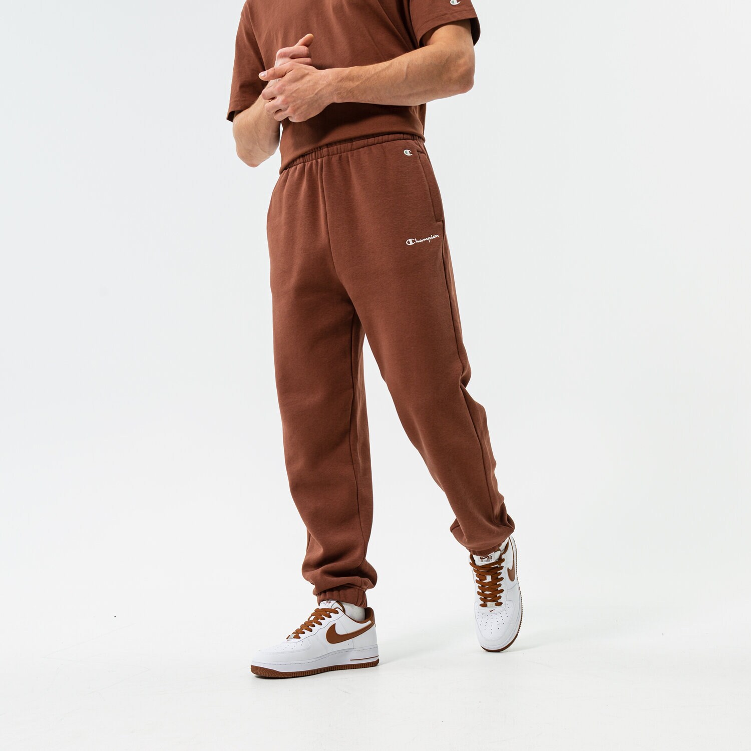 Spodnie sportowe męskie CHAMPION SPODNIE LONG PANTS 216891MS534 BRĄZOWY