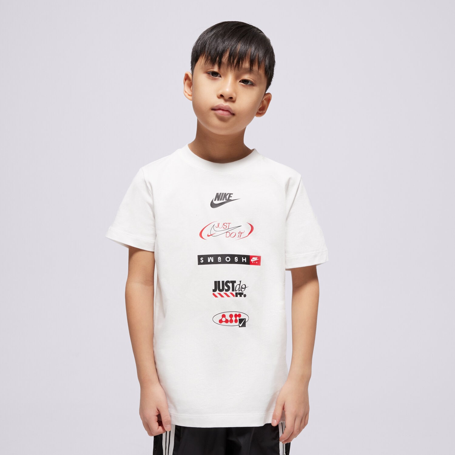Koszulka, t-shirt dla dzieci NIKE T-SHIRT K NSW TEE LOGOS BOY HM5662-100 BIAŁY