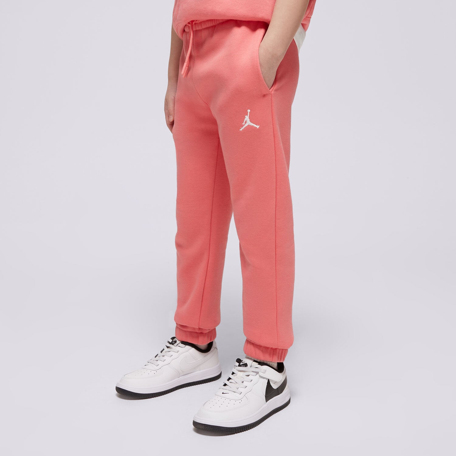 Sportowe spodnie dziecięce JORDAN SPODNIE JDG BROOKLYN ESSENTIALS PANT GIRL 4BD295-A0Y RÓŻOWY