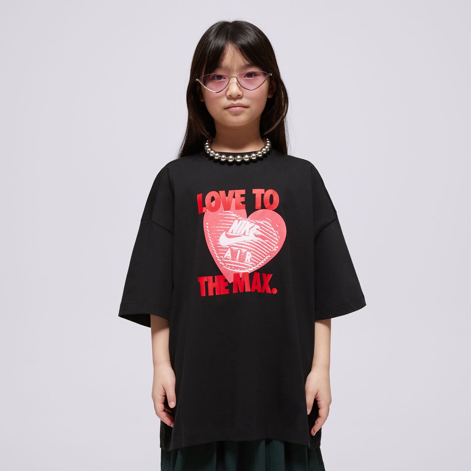 Koszulka, t-shirt dla dzieci NIKE T-SHIRT G NSW TEE HEART GIRL HM6323-010 CZARNY
