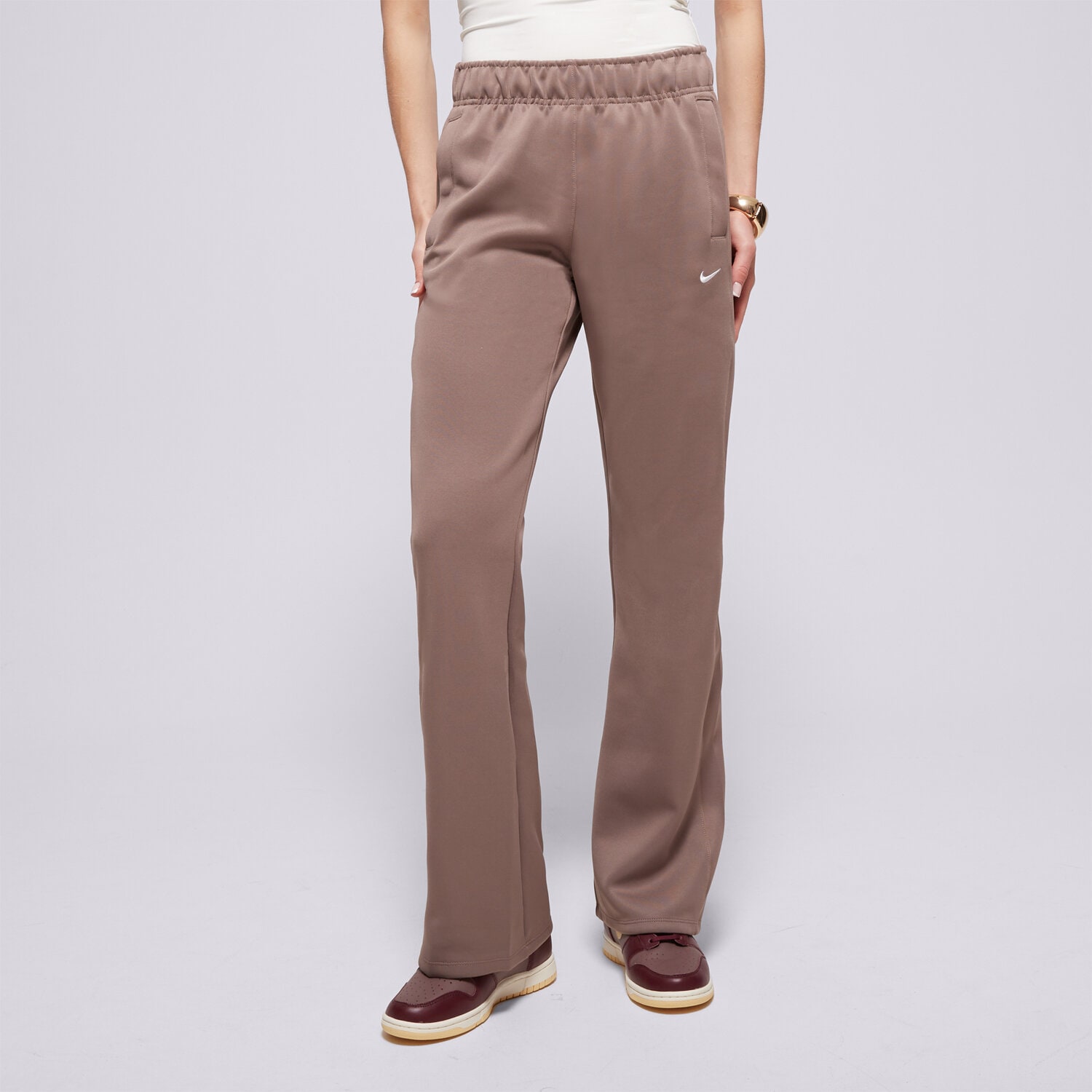 Spodnie sportowe damskie NIKE SPODNIE W NSW NK WR MR POLY KNIT PNT HJ1016-233 BRĄZOWY