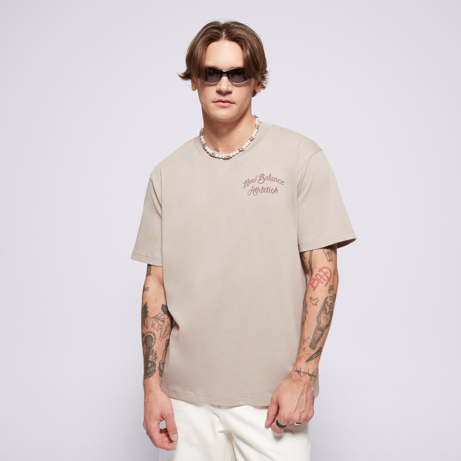 Koszulka, t-shirt sportowy męski NEW BALANCE T-SHIRT ATHLETICS RELAXED LEAGUE T-SHIRT MT43556ADS BEŻOWY