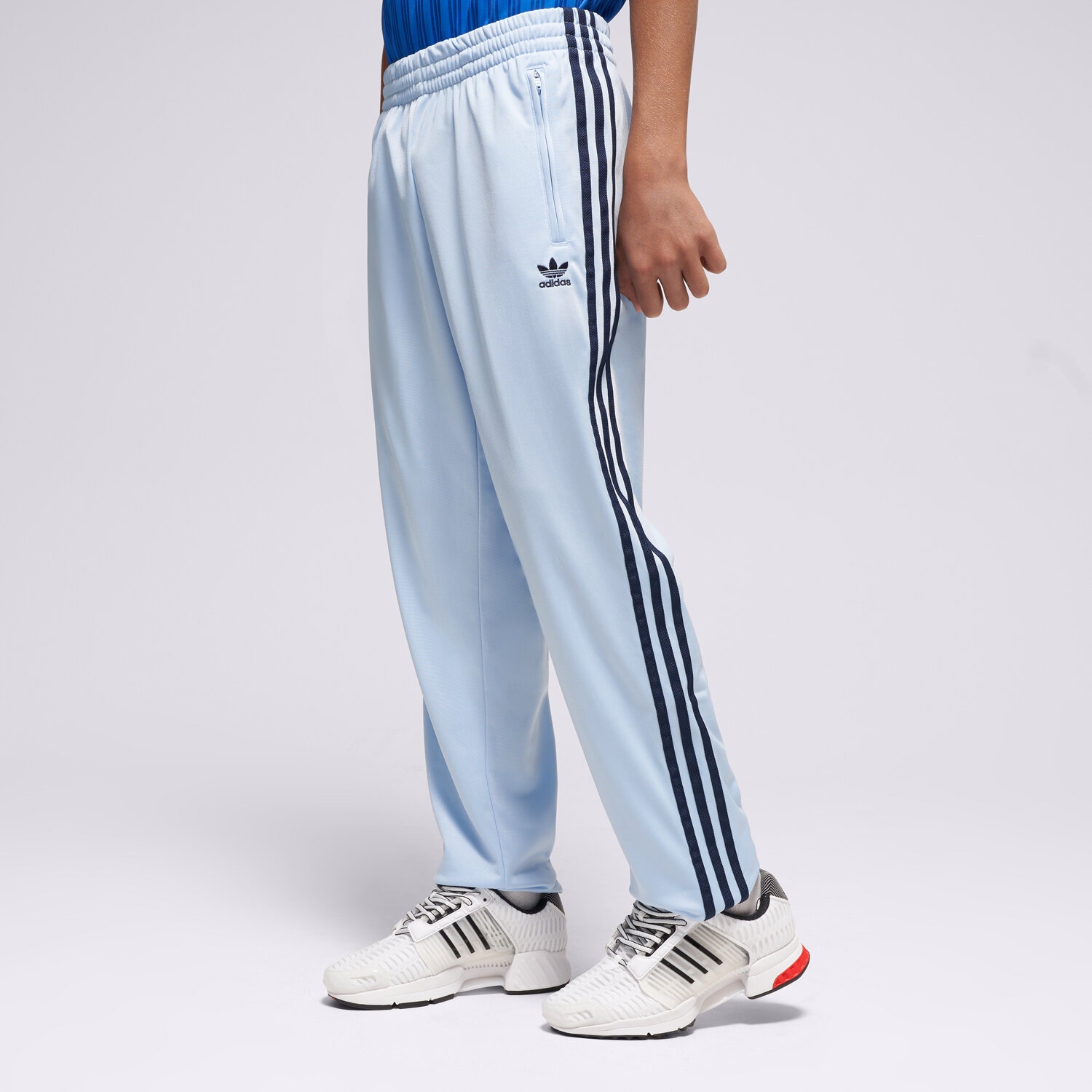 Sportowe spodnie dziecięce ADIDAS SPODNIE FIREBIRD PANTS BOYS JD1633 NIEBIESKI