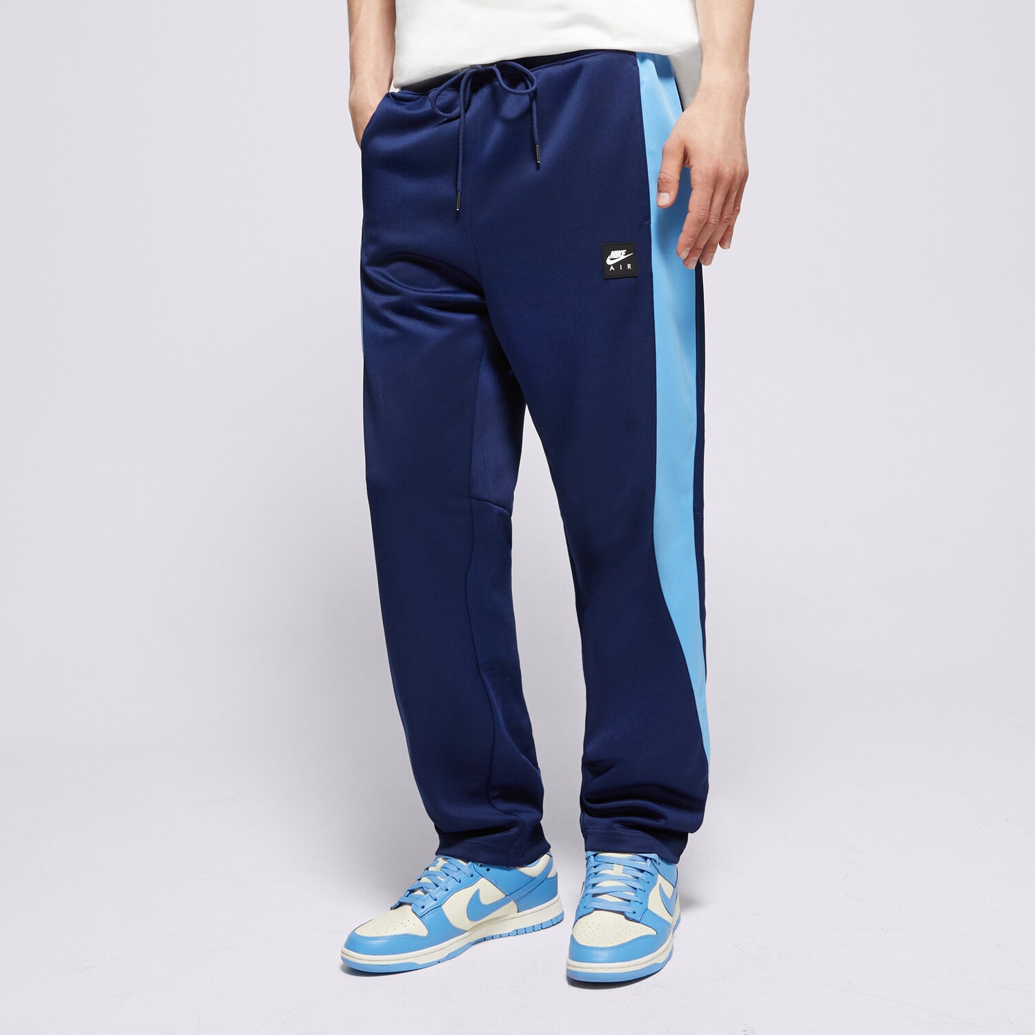 Spodnie sportowe męskie NIKE SPODNIE M NIKE AIR PK TRACK PANT HJ0283-492 GRANATOWY