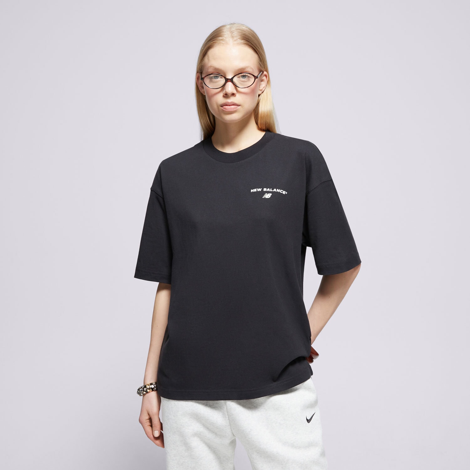 Koszulka, t-shirt damski NEW BALANCE T-SHIRT REIMAGINED OVERSIZED WT51529BK CZARNY