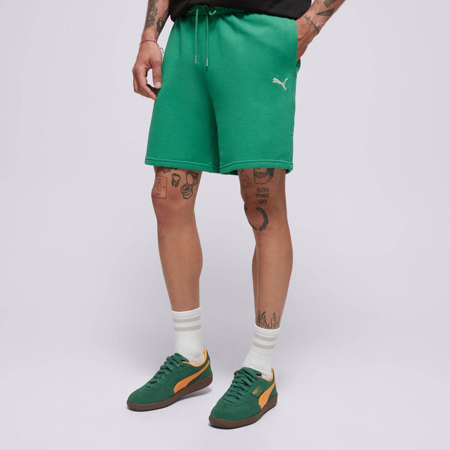 Krótkie spodenki, szorty męskie PUMA SZORTY WARDROBE ESS RELAXED SHORTS 7" TR 629654 86 ZIELONY