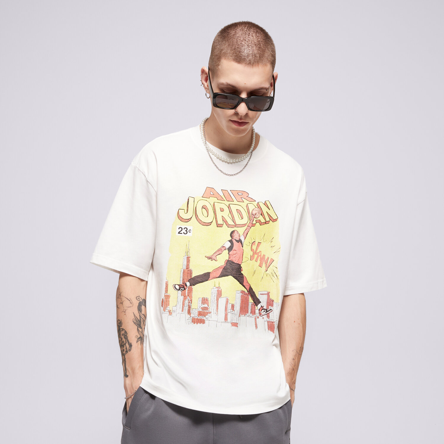 Koszulka, t-shirt sportowy męski JORDAN T-SHIRT M J NC COMIC SS CREW IF0784-100 BIAŁY