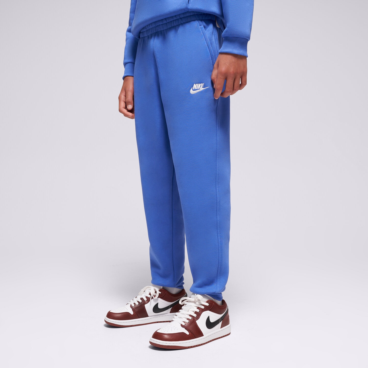 Sportowe spodnie dziecięce NIKE SPODNIE K NSW CLUB FLC JGGR LBR BOY FD3008-411 NIEBIESKI