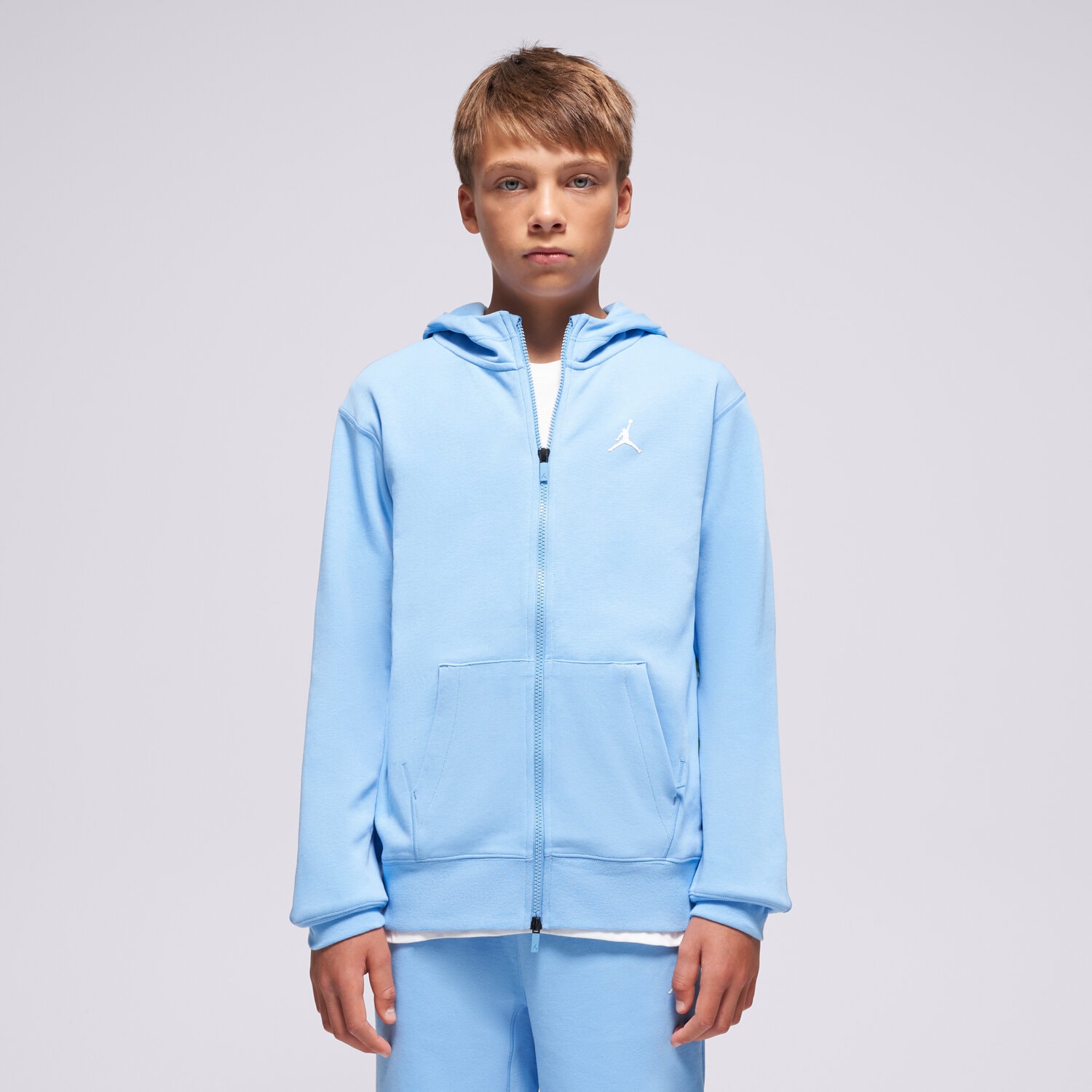Sportowa bluza dziecięca JORDAN BLUZA ROZPINANA Z KAPTUREM JDB MJ SPORT STMT HOOP FLC 95D273-B9F NIEBIESKI