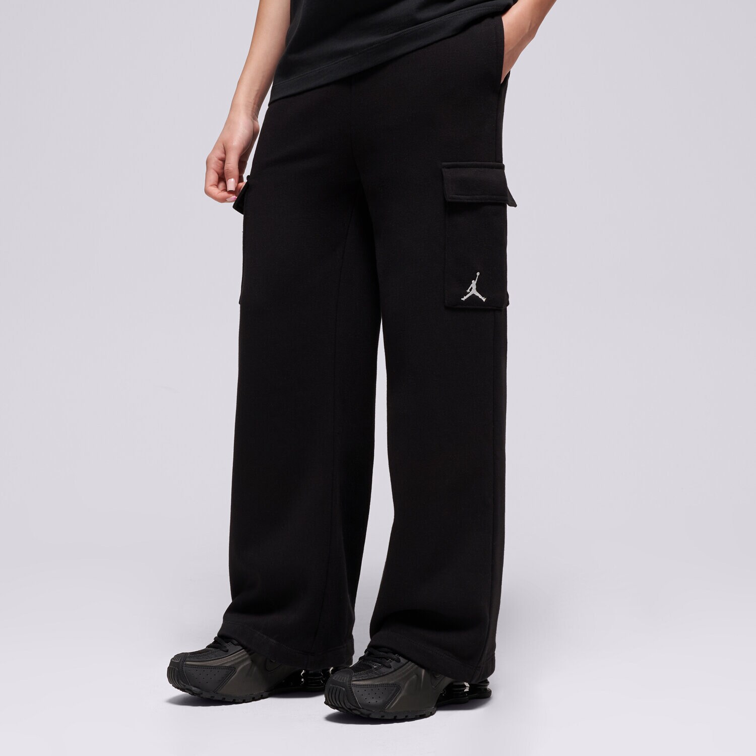 Sportowe spodnie dziecięce JORDAN SPODNIE JDG WJ BRKN FT CARGO PANT GIRL 45F143-023 CZARNY
