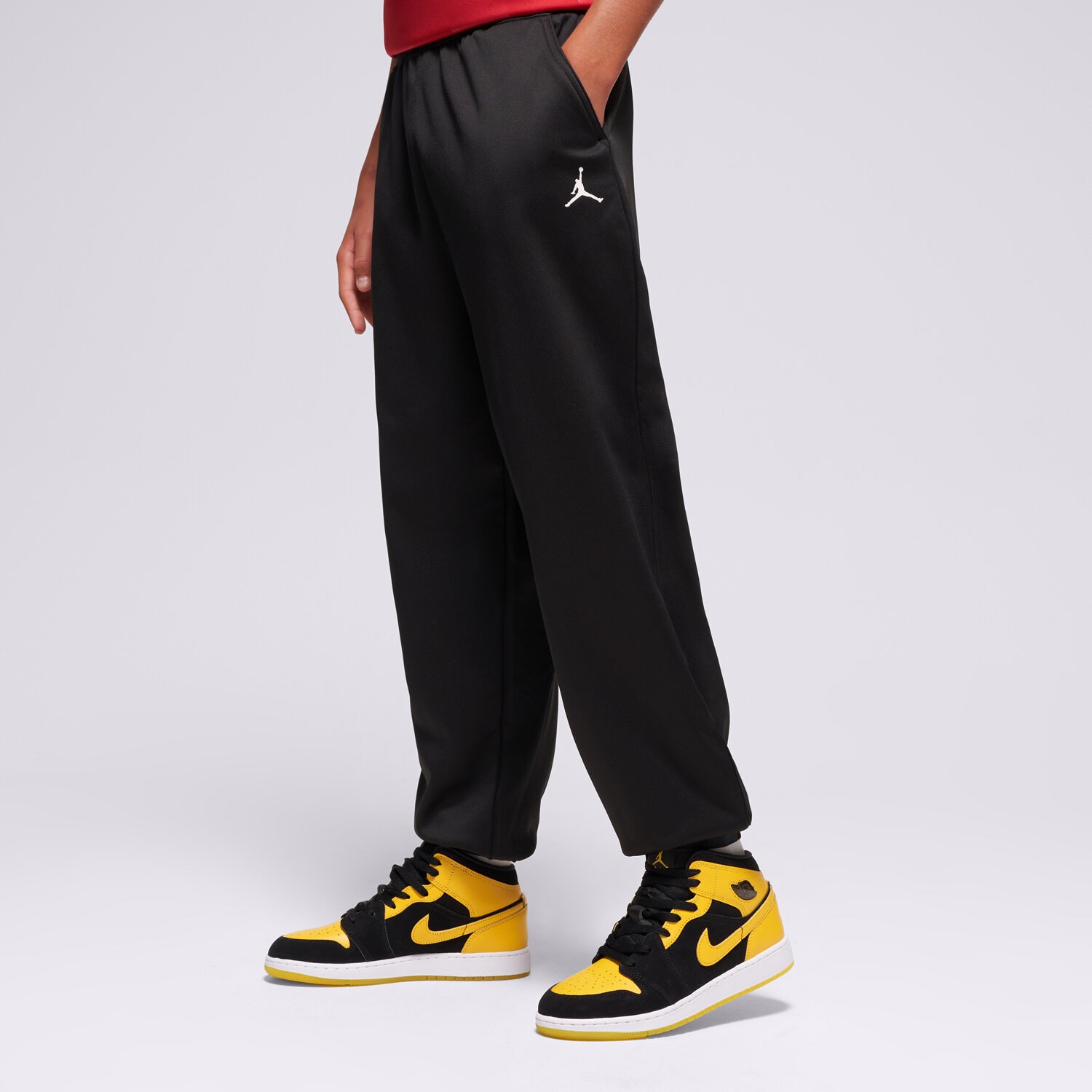 Sportowe spodnie dziecięce JORDAN SPODNIE JDN UNISEX EASE FLC SWEATPANT BOY 95D568-023 CZARNY