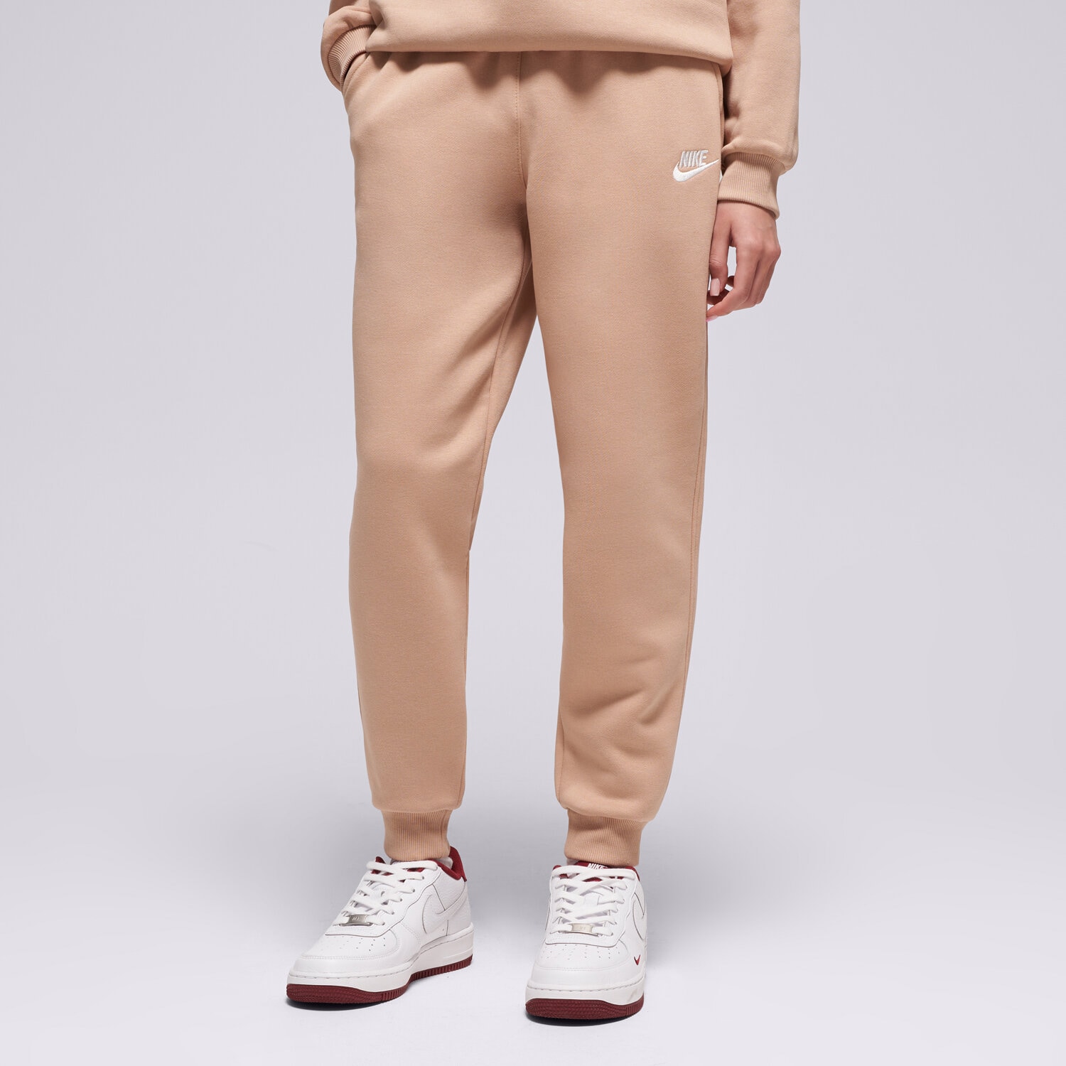 Sportowe spodnie dziecięce NIKE SPODNIE K NSW CLUB FLC JGGR LBR GIRL FD3008-200 BRĄZOWY