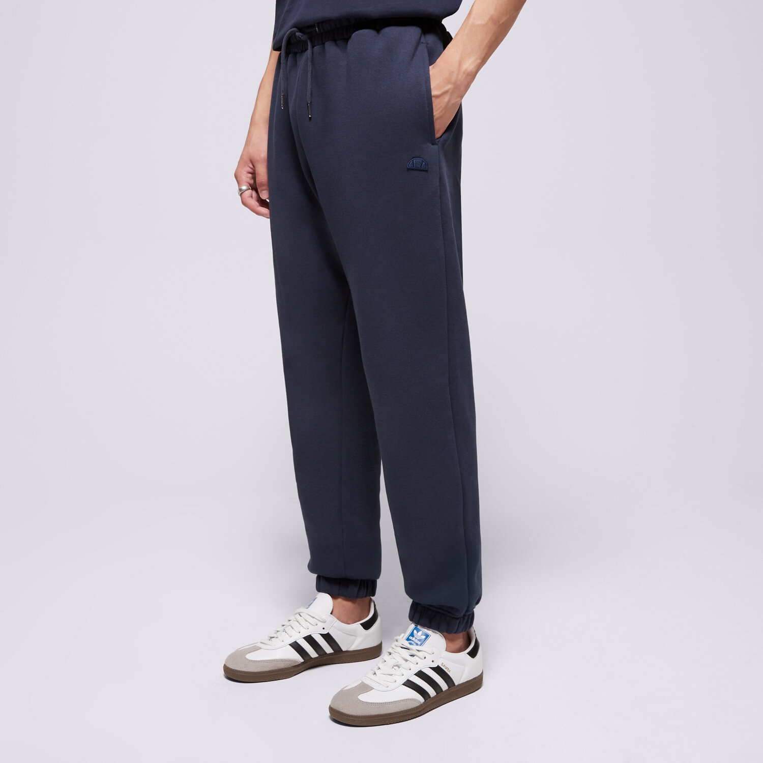 Spodnie sportowe męskie ELLESSE SPODNIE LOMMA JOG PANT NAVY MN SMG22038481 GRANATOWY