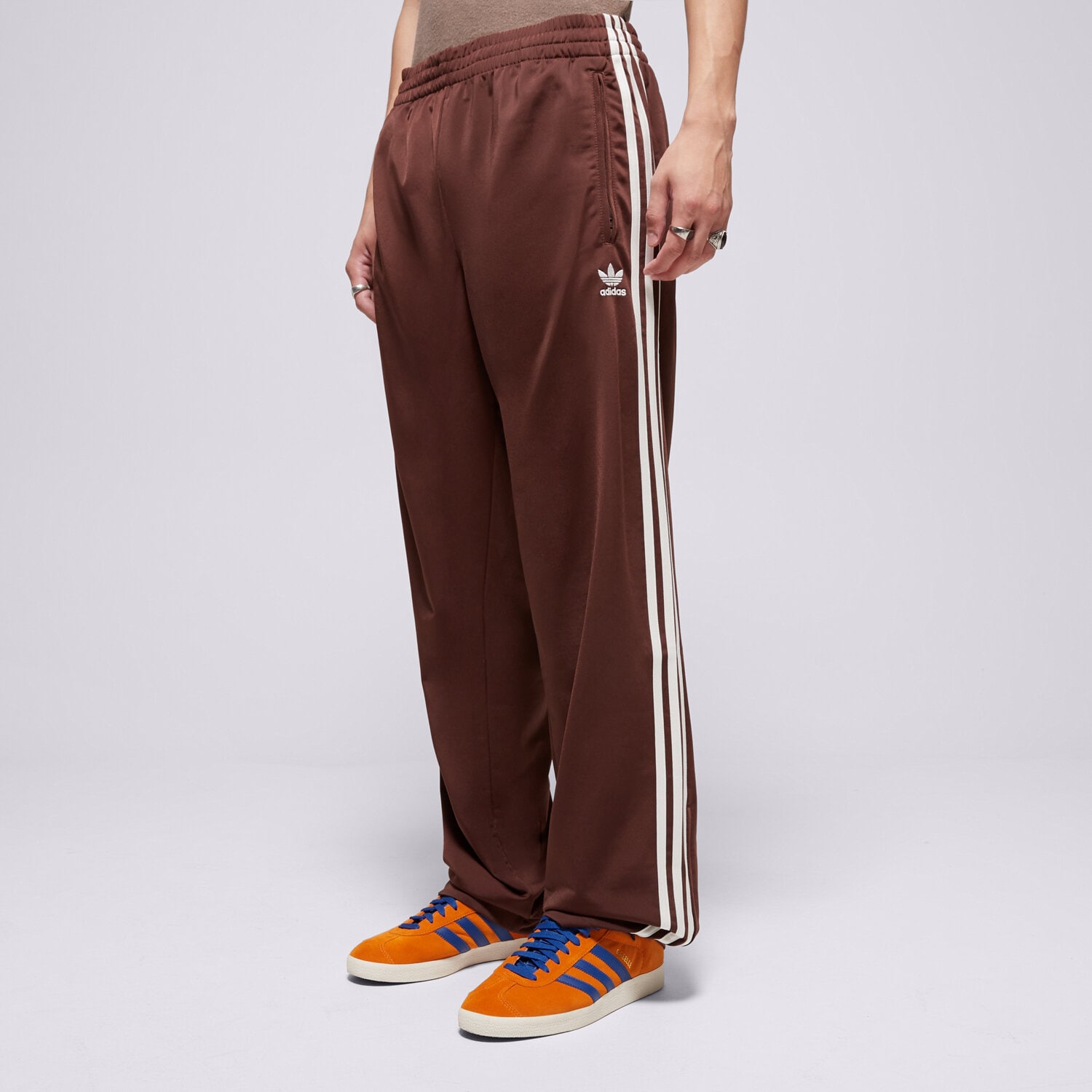 Spodnie sportowe męskie ADIDAS SPODNIE FIREBIRD TP KA0482 BRĄZOWY