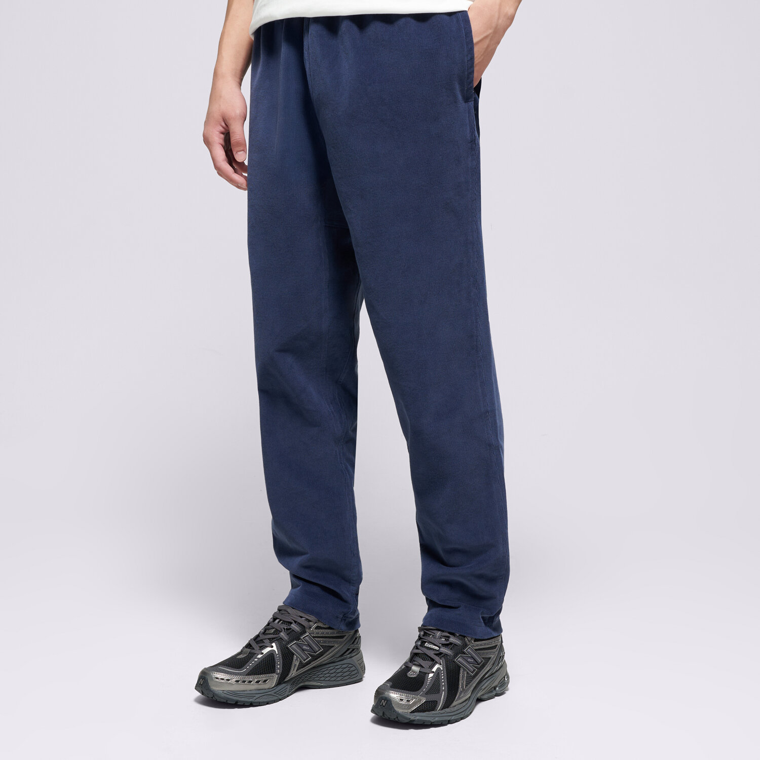 Spodnie sportowe męskie NEW BALANCE SPODNIE STRETCH CORDUROY PANT MP53521NNY GRANATOWY