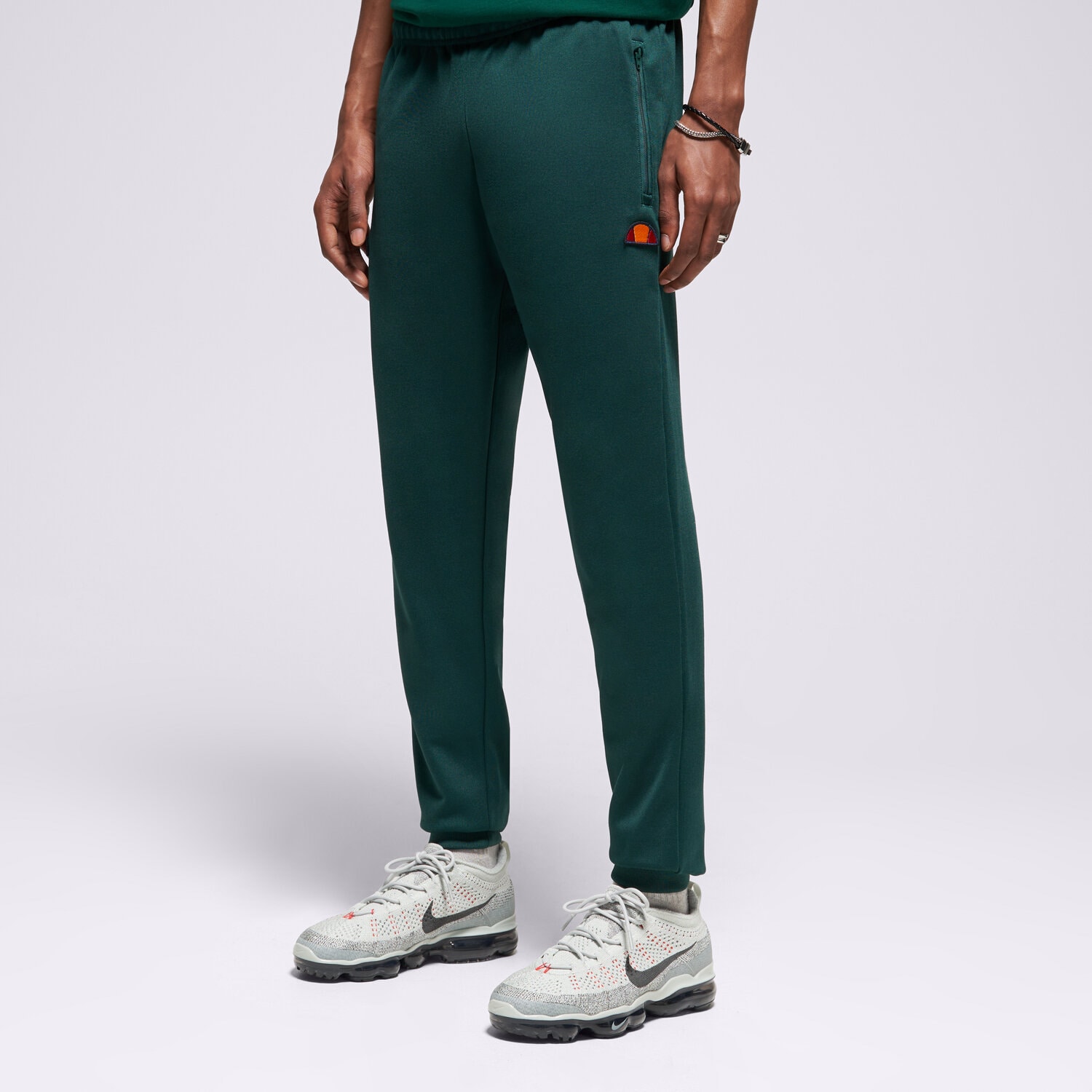 Spodnie sportowe męskie ELLESSE SPODNIE BERTONI TRACK PANT DGREEN SHR04351502 ZIELONY