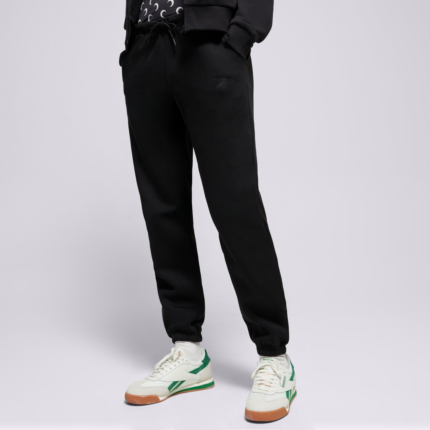 Spodnie sportowe damskie REEBOK SPODNIE AMANDA ELASTICATED 100239801 CZARNY