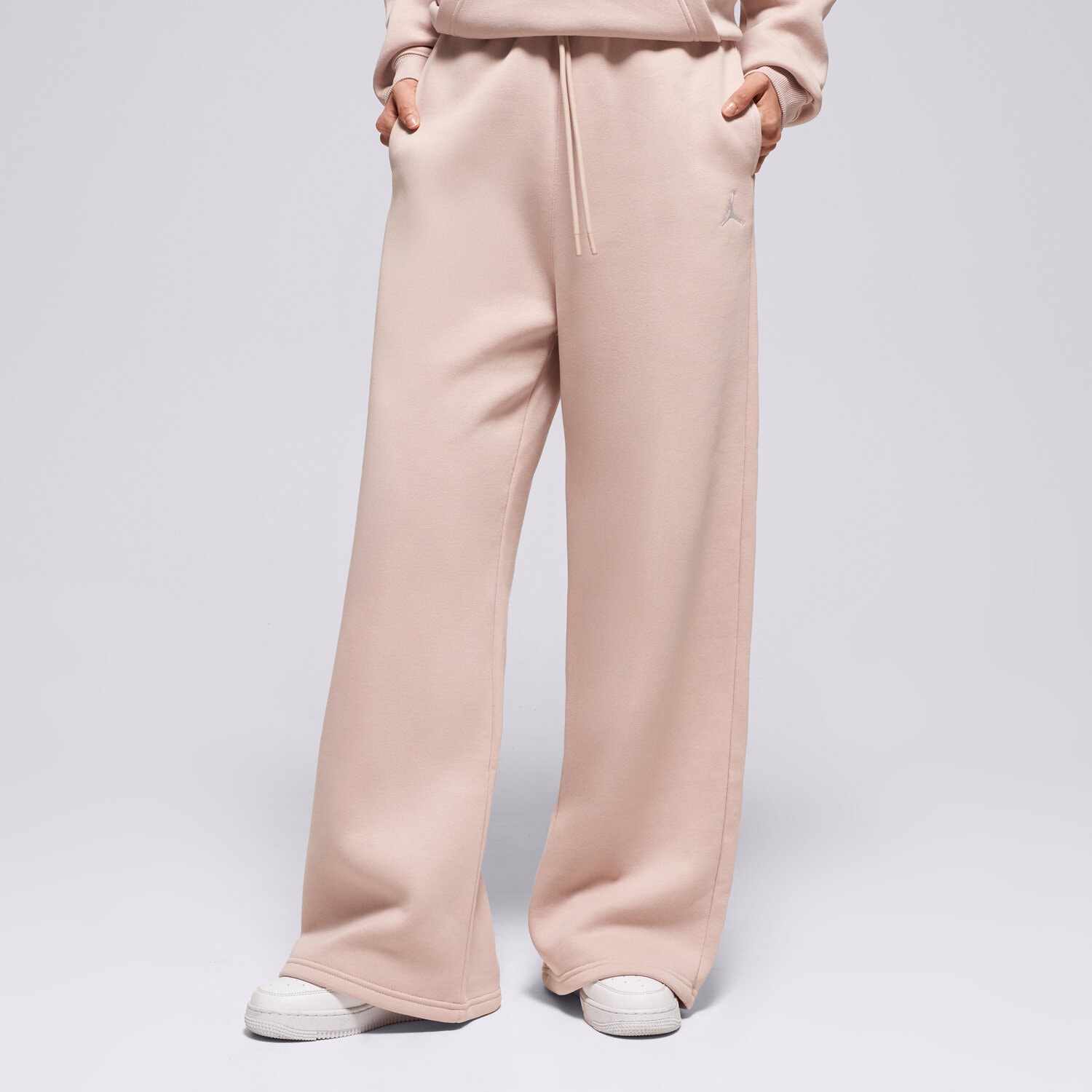 Spodnie sportowe damskie JORDAN SPODNIE W J BRK FLC OH PANT IH2394-292 BEŻOWY