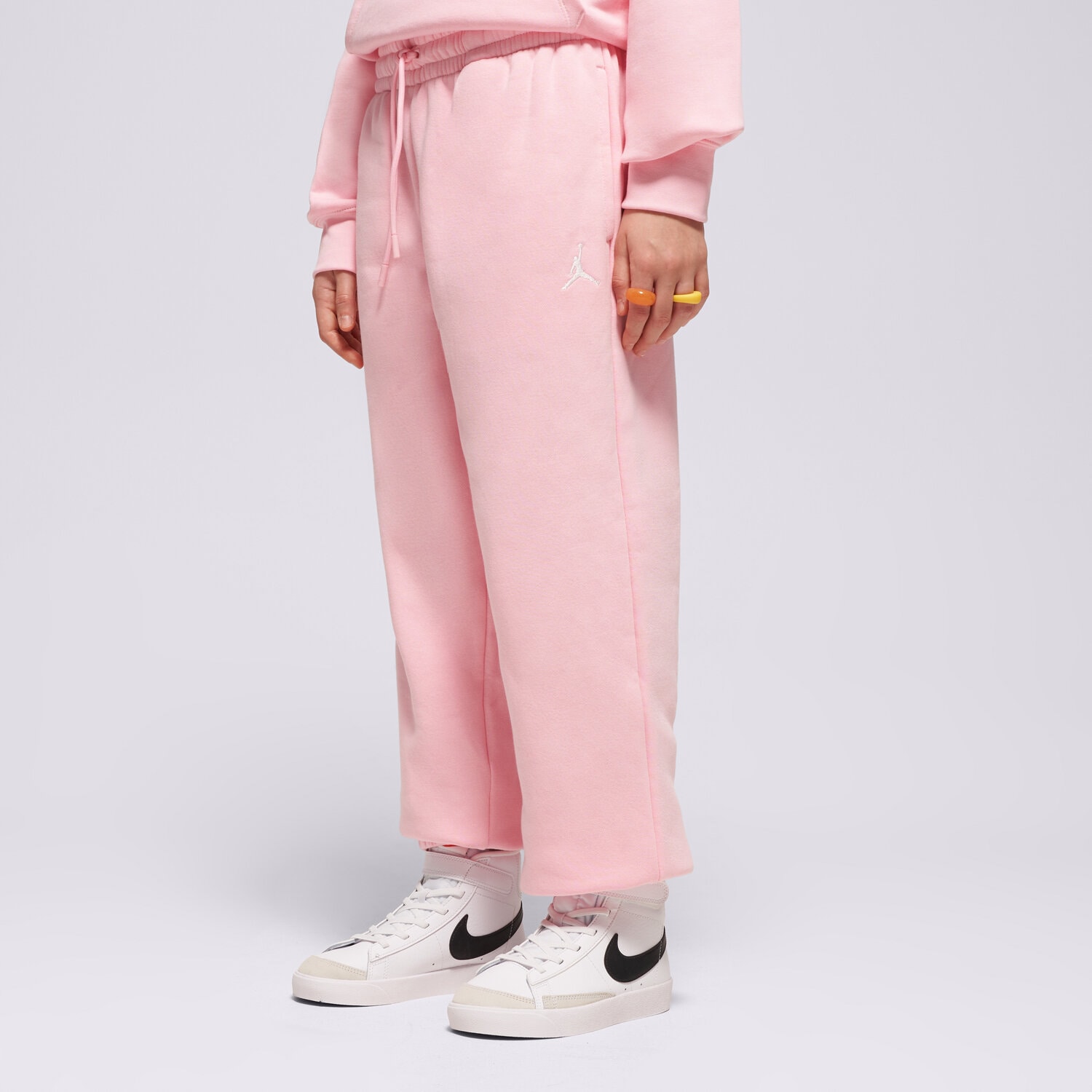 Sportowe spodnie dziecięce JORDAN SPODNIE WJ BRKN FLC PANT GIRL 45F138-A0W RÓŻOWY