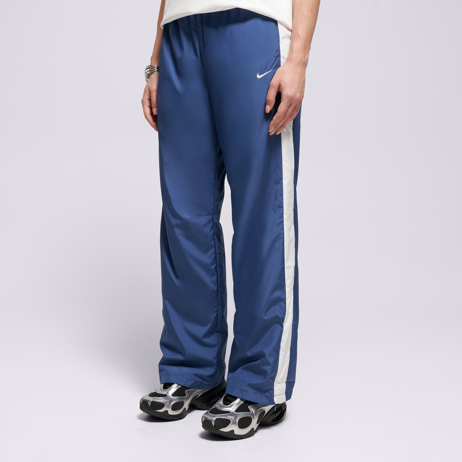 Spodnie sportowe damskie NIKE SPODNIE NK CLSSC OH PANT W NSW HV2324-461 NIEBIESKI