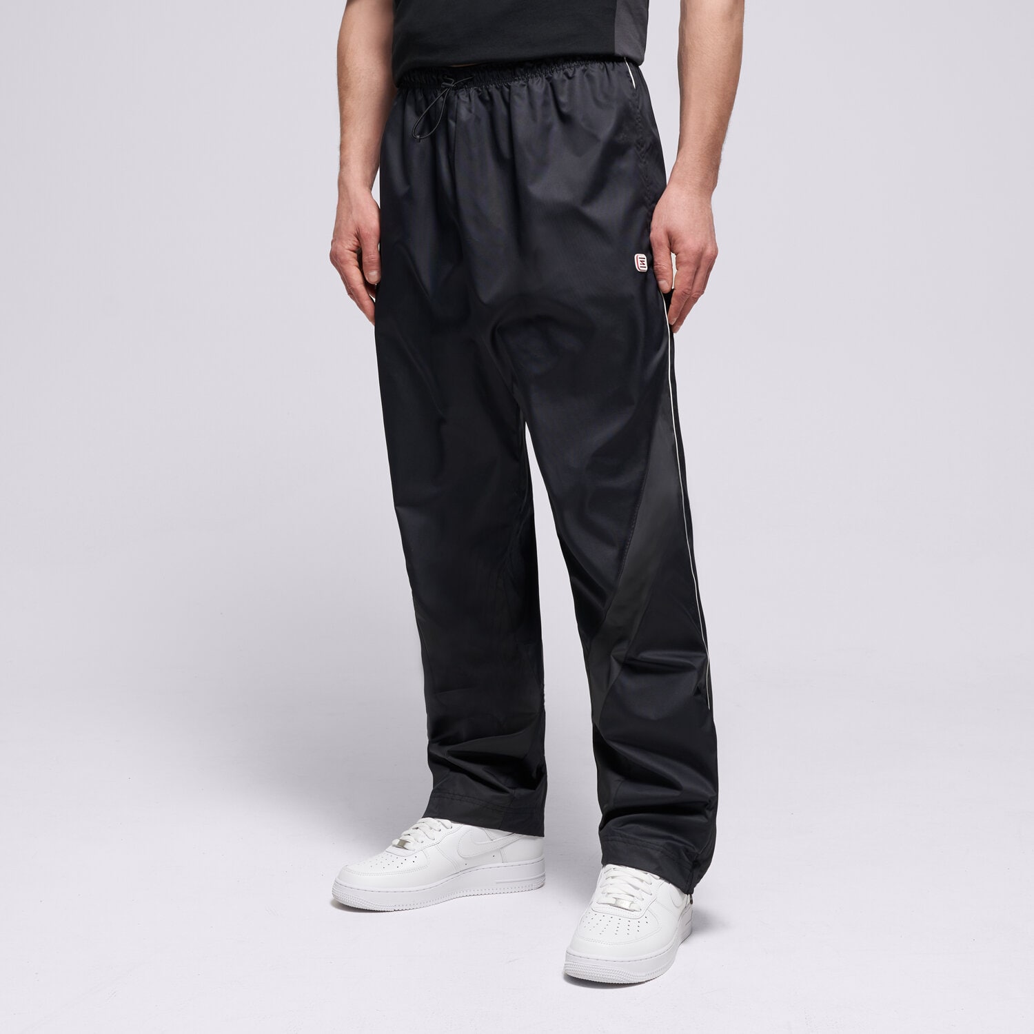 Spodnie sportowe męskie NIKE SPODNIE M NSW WVN PANT SHOX IH0653-010 CZARNY