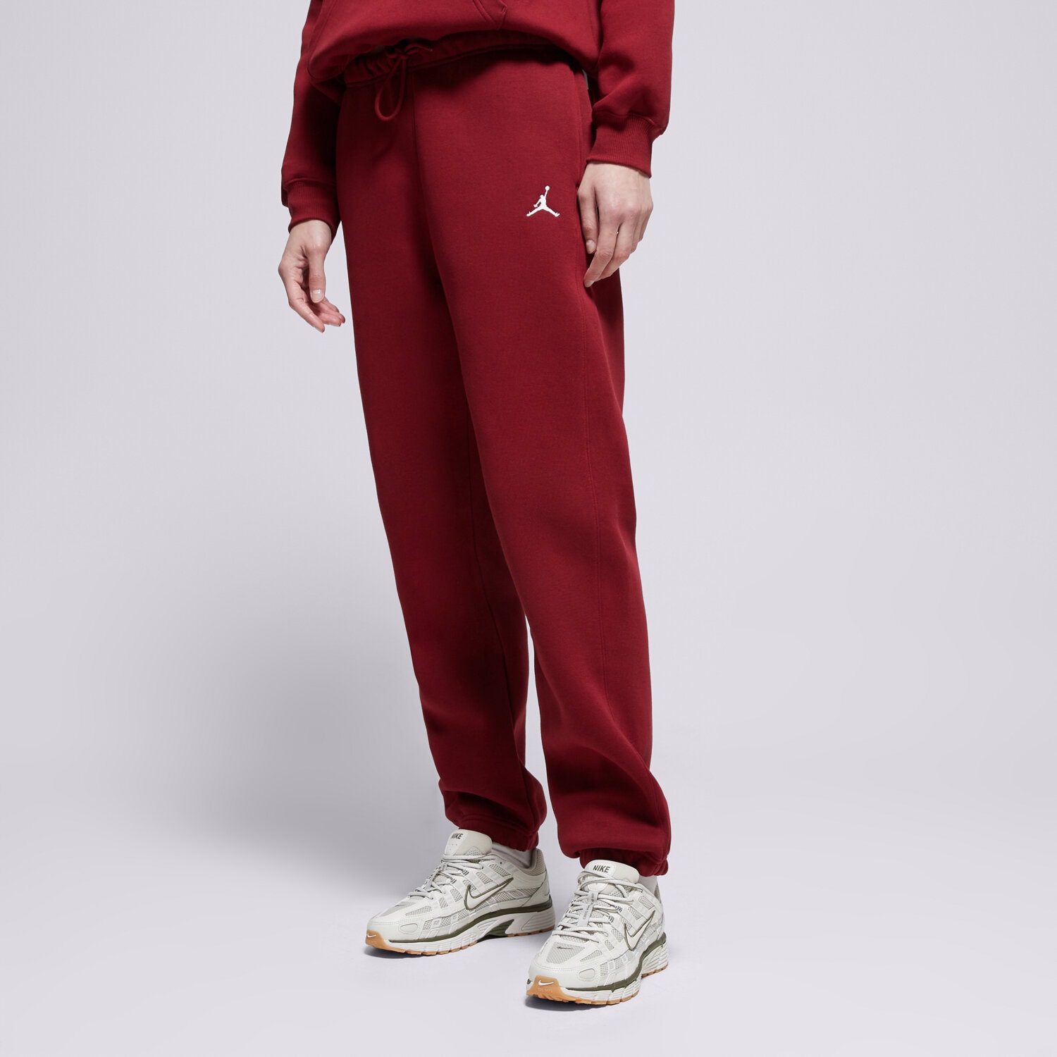 Spodnie sportowe damskie JORDAN SPODNIE JBROOKLYN FLEECE FV7077-677 BORDOWY