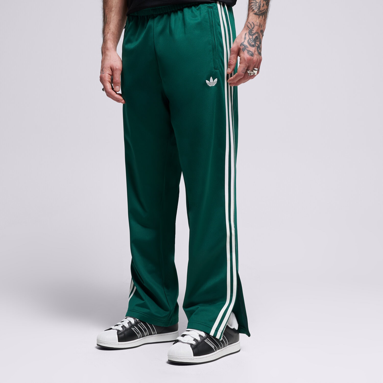 Spodnie sportowe męskie ADIDAS SPODNIE FIREBIRD TP KD8317 ZIELONY