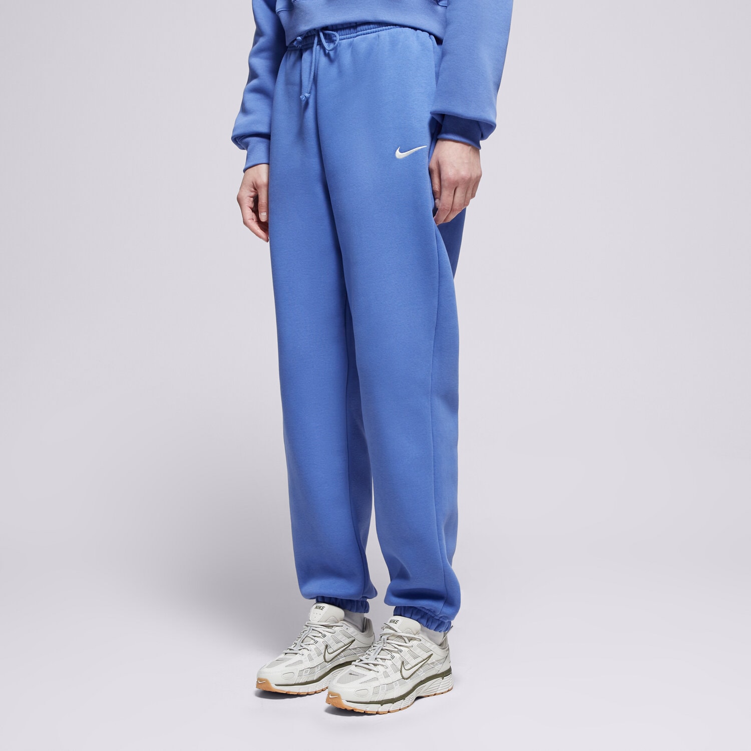 Spodnie sportowe damskie NIKE SPODNIE PHNX FLC HR OS PANT 2 W NSW FZ5996-460 NIEBIESKI