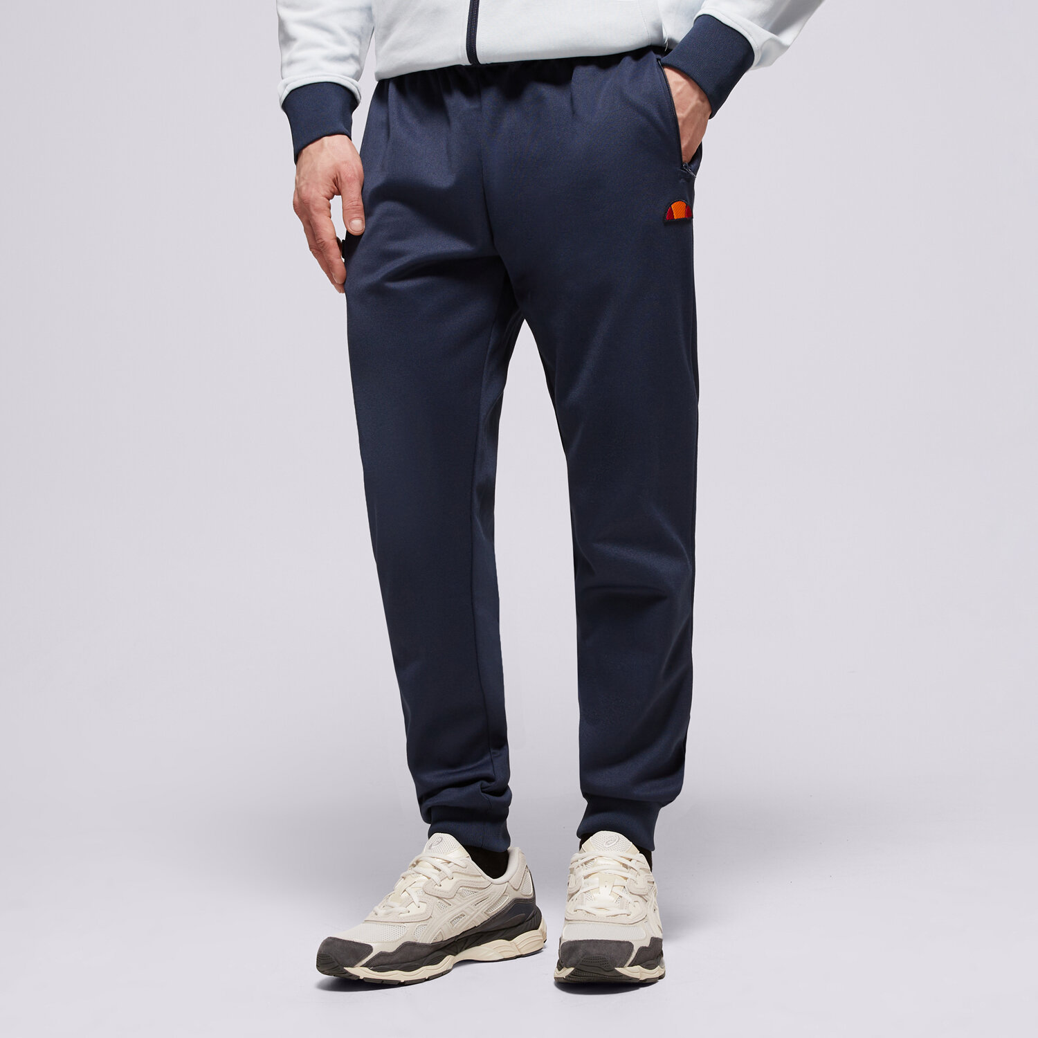 Spodnie sportowe męskie ELLESSE SPODNIE BERTONI TRACK PANT NAVY SHR04351429 GRANATOWY