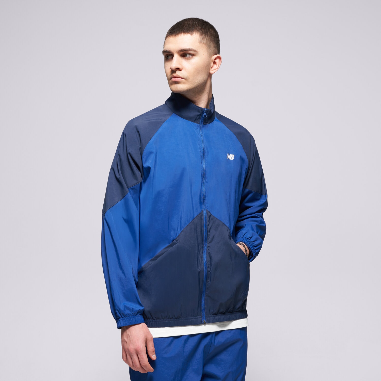 Kurtka wiosenna / jesienna męska NEW BALANCE KURTKA ORTALION SPORT LEGACY JACKET MJ61J73YNNY GRANATOWY