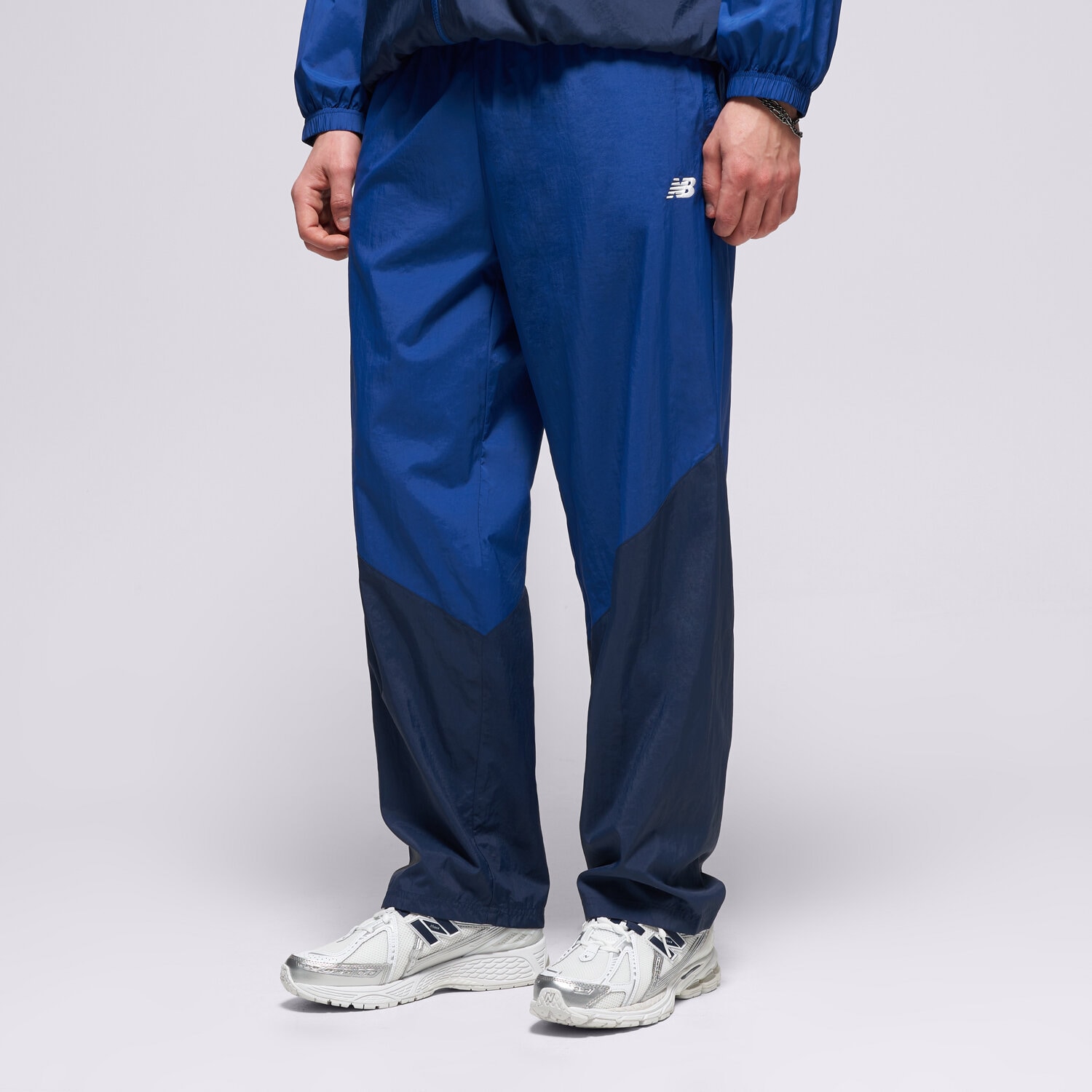Spodnie sportowe męskie NEW BALANCE SPODNIE SPORT LEGACY PANT MB61R010NNY GRANATOWY