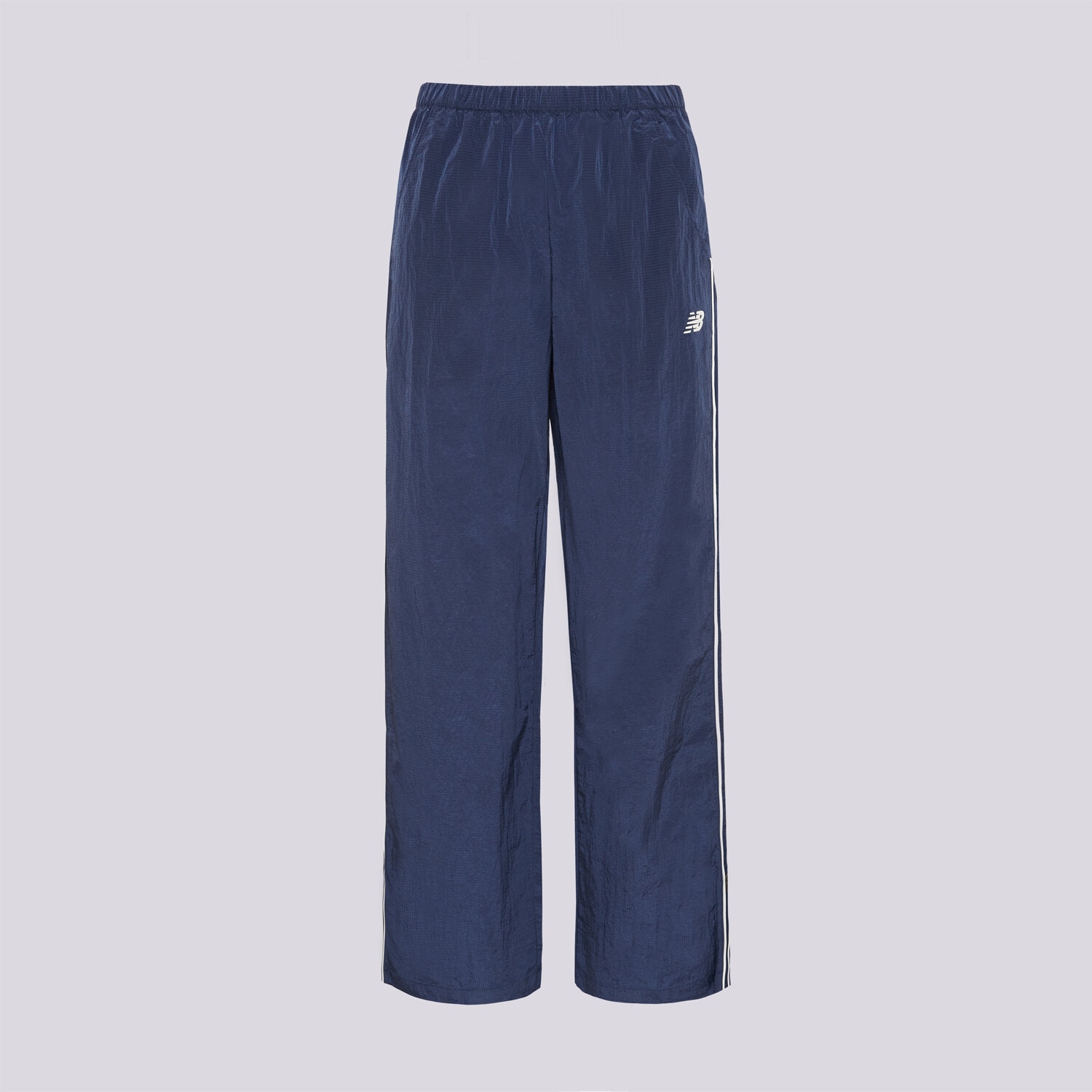 Spodnie sportowe damskie NEW BALANCE SPODNIE SPORT LEGACY PANT WB61Z1E6NNY GRANATOWY