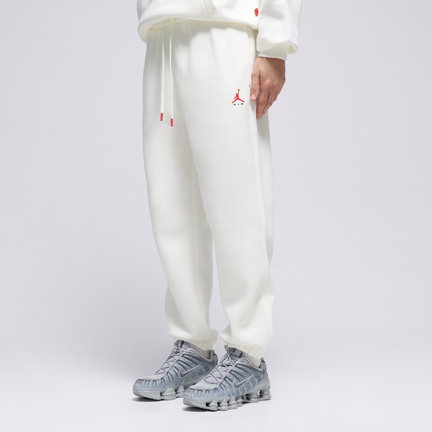 Spodnie sportowe męskie JORDAN SPODNIE M J BRK ST FLC CUFF PANT BB IM8906-133 BIAŁY