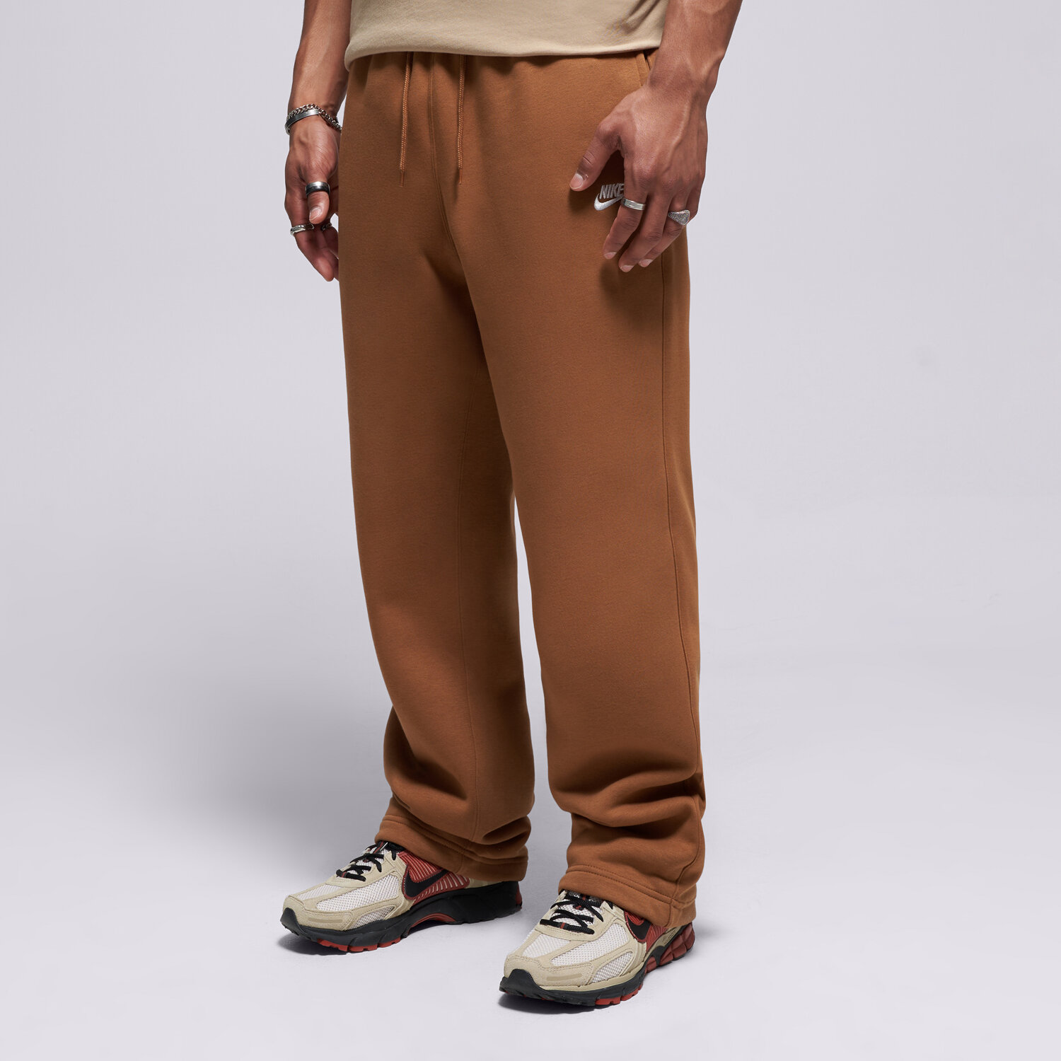 Spodnie sportowe męskie NIKE SPODNIE M NK CLUB BB BUNGEE PANT IF0488-270 BRĄZOWY