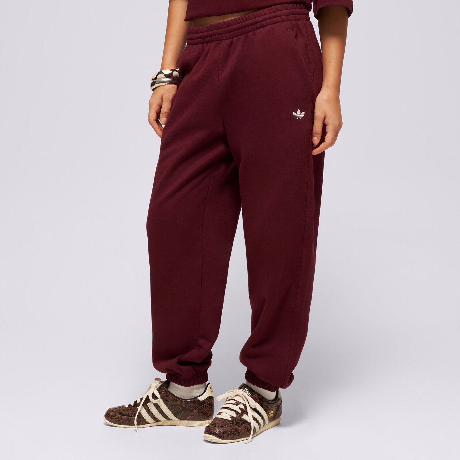 Spodnie sportowe damskie ADIDAS SPODNIE ESS FL JOGGER KT2265 FIOLETOWY