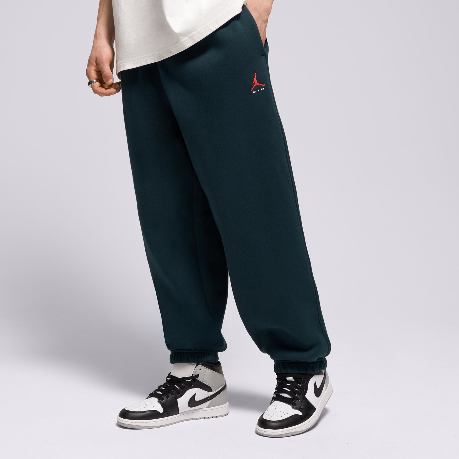 Spodnie sportowe męskie JORDAN SPODNIE M J BRK ST FLC CUFF PANT BB IM8906-378 ZIELONY